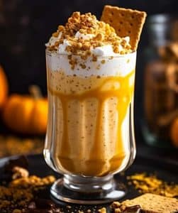 Halloween Pumpkin Smoothie garnished with crumbled Graham crackers